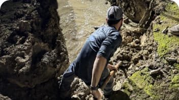 Fieldstone worker fixing leak at jobsite